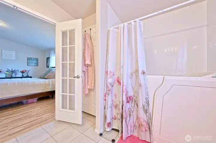 The primary ensuite includes an upgraded "sitting tub" with an easy door access The primary ensuite includes an upgraded "sitting tub" with an easy door access