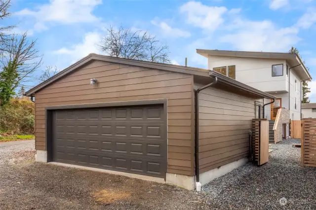 Oversized two car garage off alley PLUS tons of street parking on the large corner lot!