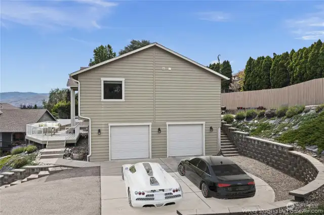Plenty of parking outside and of the garage along with an oversized 2 car garage with storage.