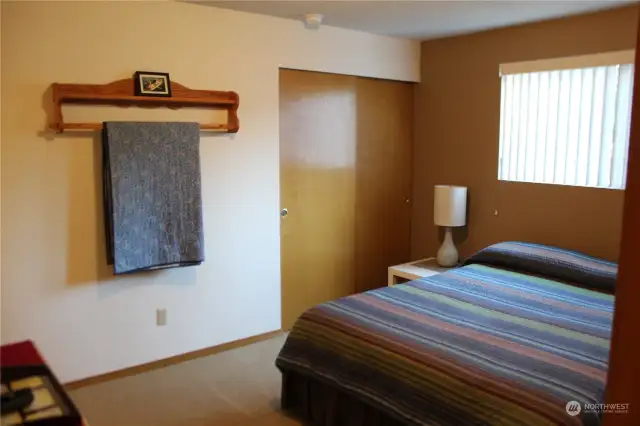 Primary bedroom with dual closets