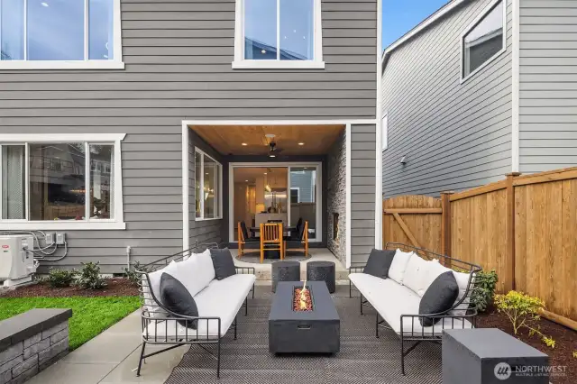 Sliding stacking doors leading from great room kitchen area to outdoor living space