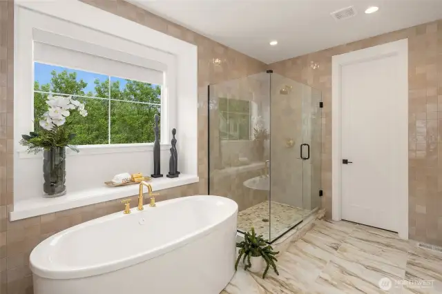 Primary bath with relaxing freestanding soaking tub