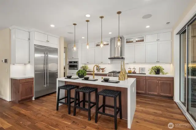 JennAir appliances, including a built-in refrigerator, 5 burner gas range and convection microwave oven