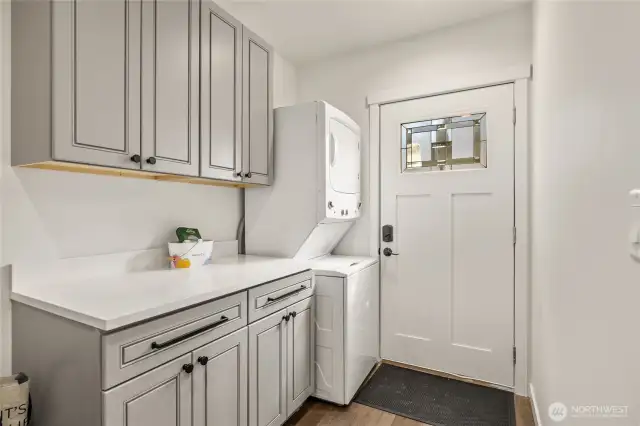 Laundry room with side door