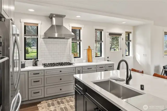 Quartz and tile kitchen.