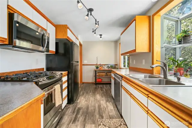 Sunny kitchen with garden window.