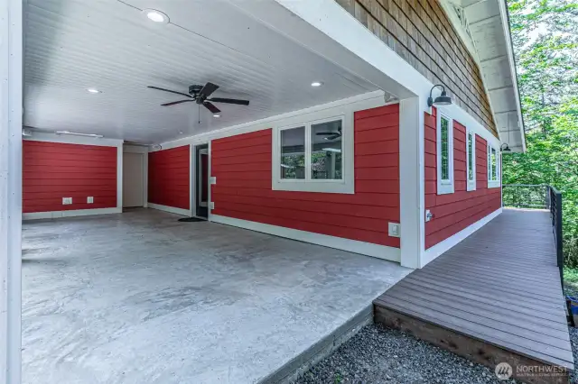 Fully covered front porch, note the recessed lighting and the start of the wrap around porch