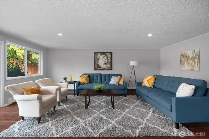 Bonus room/alternative primary bedroom which has views of the backyard & pastures and includes a patio space
