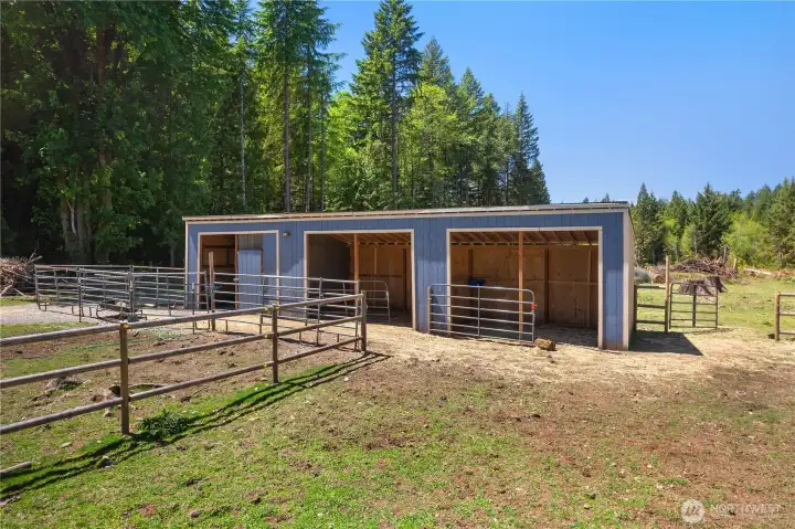 Stable has room for cows or horses and also has a chicken coop