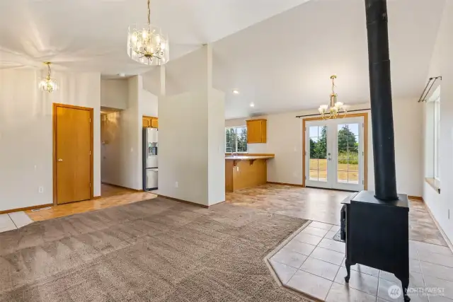 Open Concept Kitchen/Living/Dining with Wood Stove