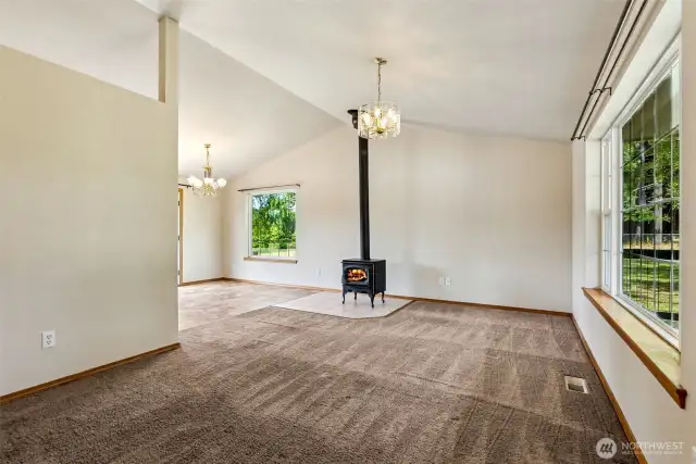 Living Room w/ Wood Stove & Big Windows