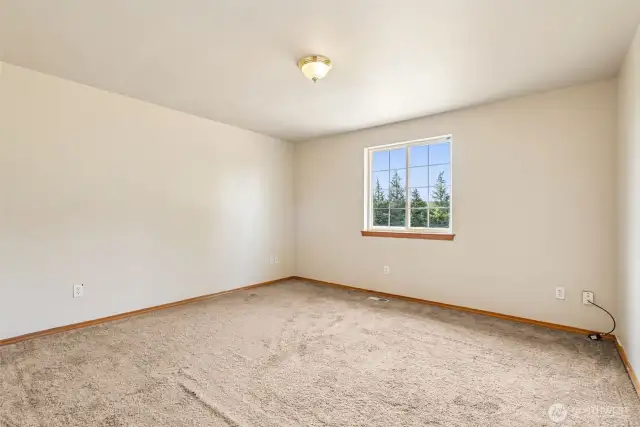Primary Bedroom w/ Walk-in Closet and Full En-suite Bathroom