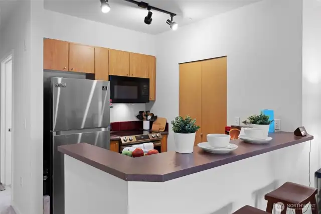 Kitchen with newer appliances.