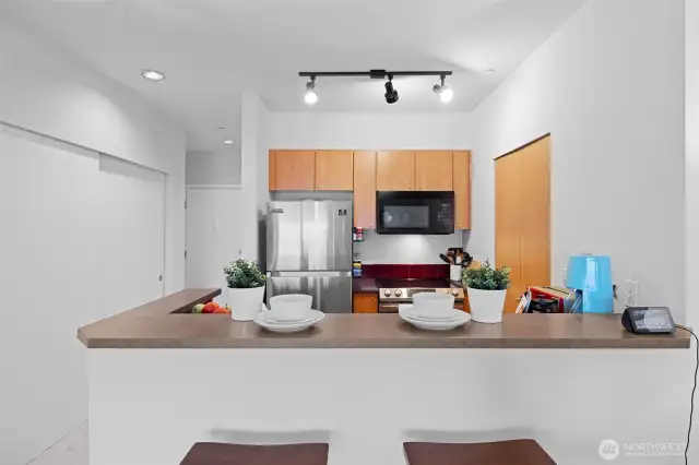 Kitchen with newer appliances.