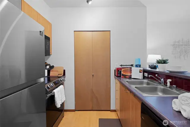 Kitchen with newer appliances.