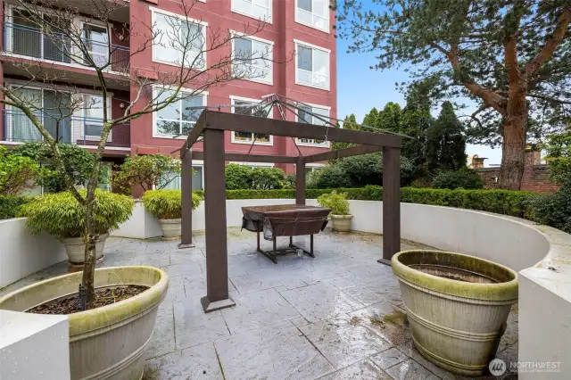 Rooftop Deck with barbecue grill. Seasonal community gatherings are held here.