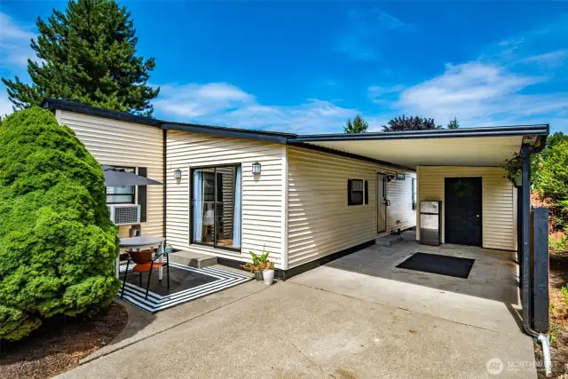 Carport provides protection from the elements and the shed gives you room to store/organize your extra belongings.