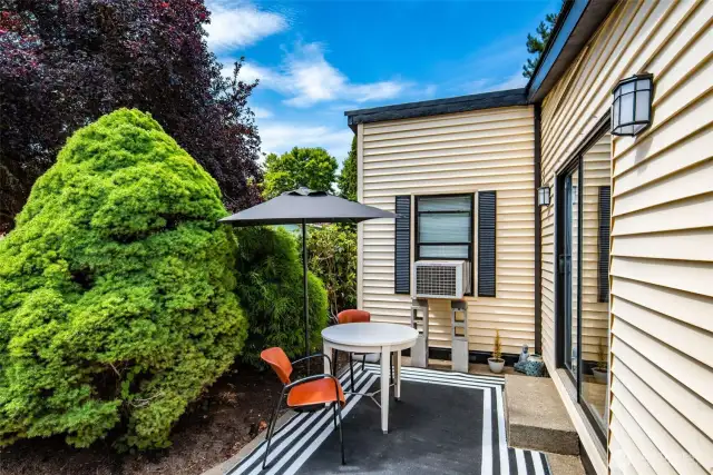 Sliding door from kitchen to patio makes this the perfect hang out/BBQ spot.
