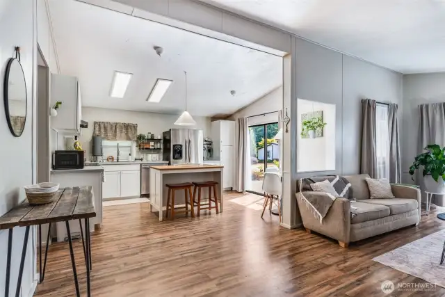 Completely remodeled eat-in kitchen with vaulted ceiling, center island, breakfast nook & more!