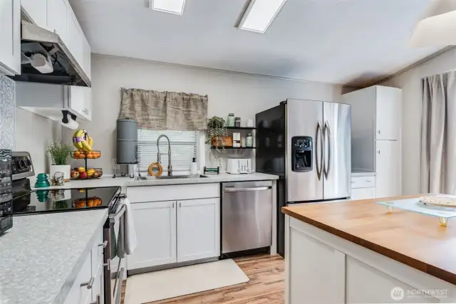 Enjoy NEW Shaker cabinets and NEW countertops!