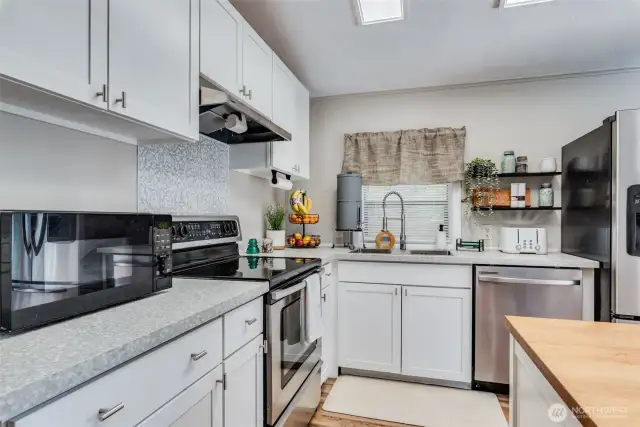 Create your favorite recipes using the new glass SS cooktop stove and new vent hood.