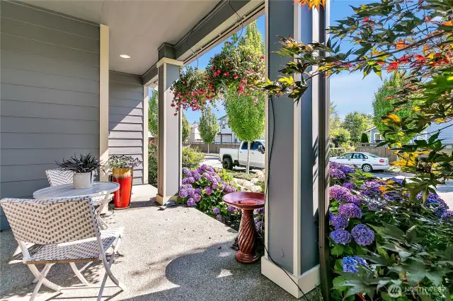 Front patio and beautiful front landscaping.