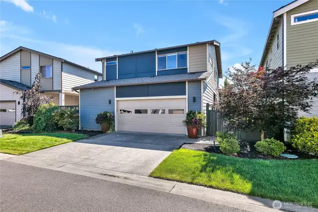 Alley entrance to 2-car attached garage plus additional driveway parking!