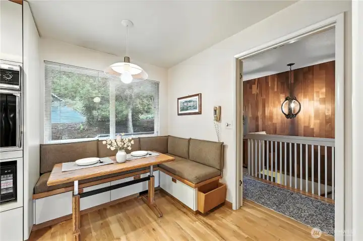 Custom-designed seating and table set with adjustable height for enhanced comfort and flexibility.