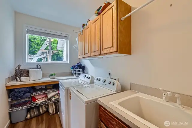 Laundry room with convenient sink.