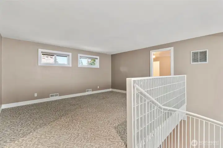 Now we are upstairs in the loft area.  There are two bedrooms, one on each side of the loft.