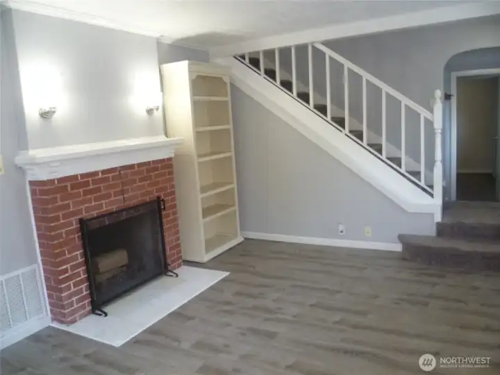 Living room with wood burning fireplace