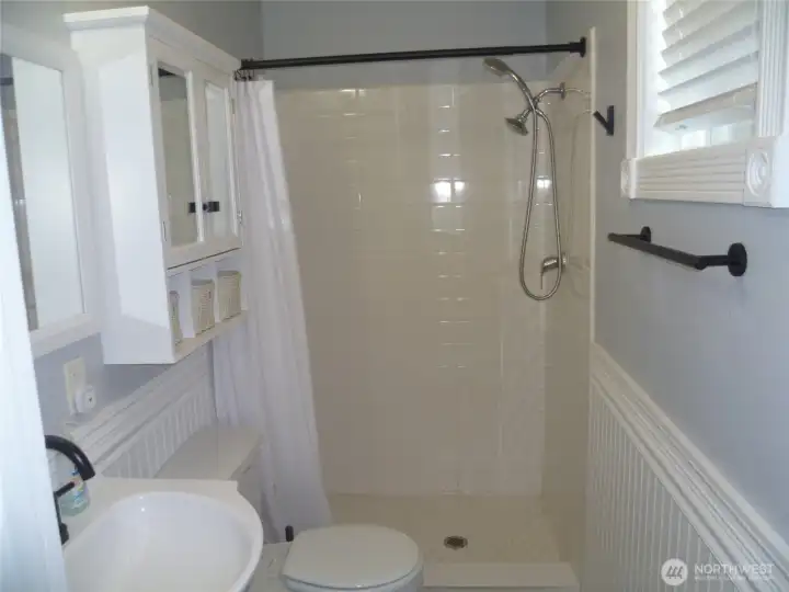 Main level bathroom with shower