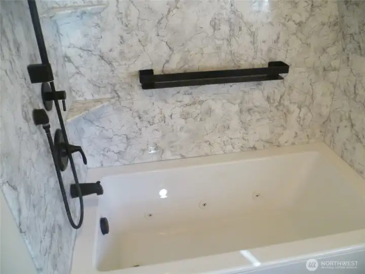 Upper bathroom jetted tub