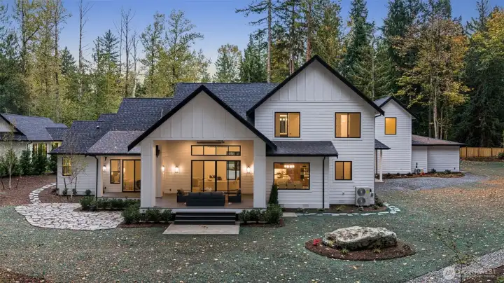 A thoughtfully designed, covered and heated outdoor terrace provides comfort and connection year-round.