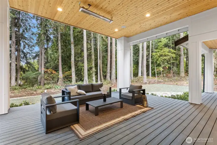 A thoughtfully designed, covered and heated outdoor terrace provides comfort and connection year-round.