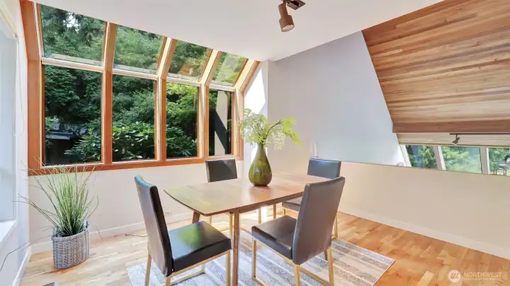 Enjoy meals surrounded by lush greenery in this light-filled dining nook