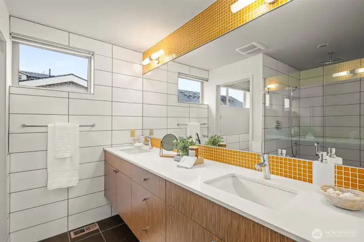 Spa-like primary bathroom with luxurious, oversized shower and double sinks