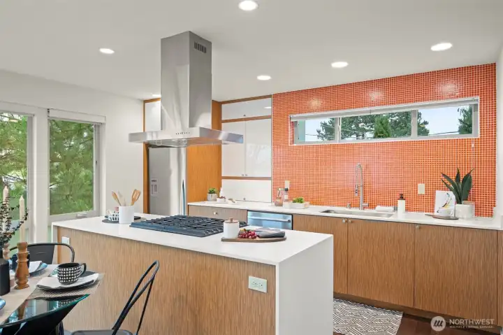 Beautiful waterfall quartz island and stainless steel appliances