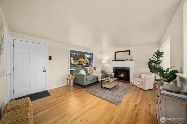 Newly renovated hardwood floors and fresh paint throughout the main level.