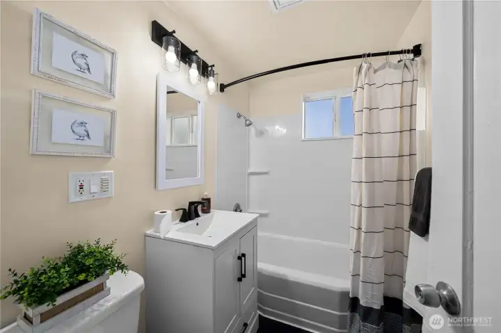 Recently refreshed full bath.