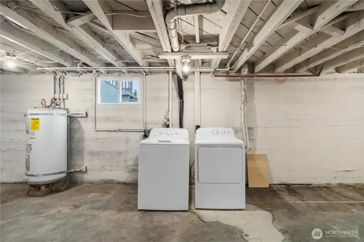 Washer, dryer, hot water and furnace in the basement.