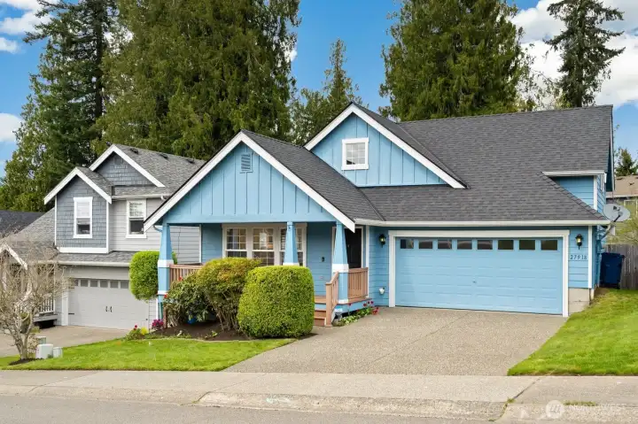 Distinguished by soaring vaulted ceilings, a primary-on-main floor plan, and versatile upper-level flex spaces, the home is situated in a serene Duvall setting designed for both effortless connection and everyday comfort.