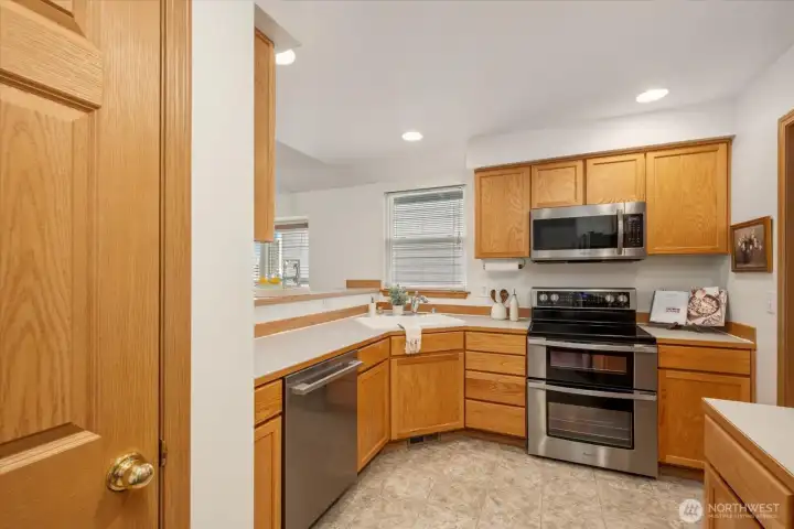 Well-appointed kitchen featuring a functional layout and generous storage, great for the home chef!