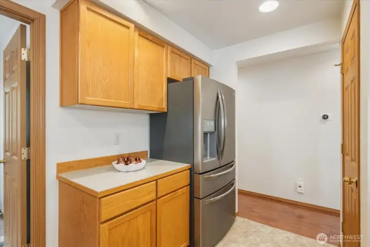 Ample cabinetry and dedicated space offer practical storage for everyday organization.