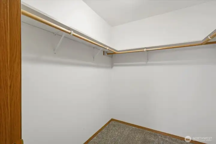 Large walk-in closet providing ample storage and organization opportunities.