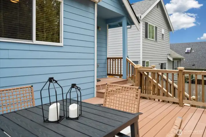 Retractable awning creates a comfortable, shaded outdoor experience.