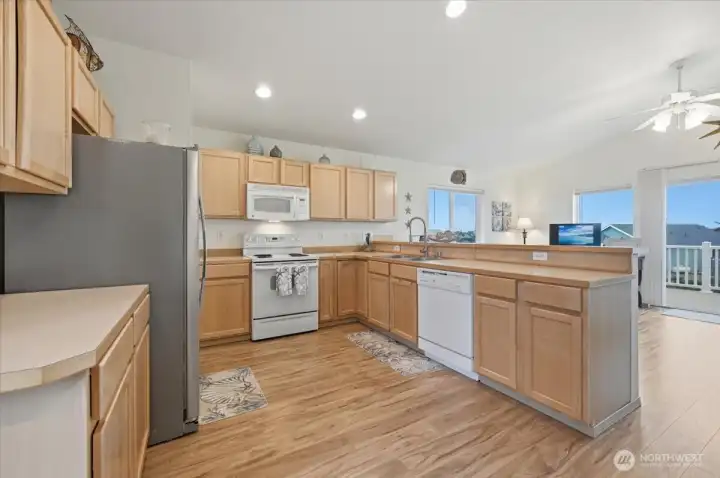 Spacious kitchen has plenty of cabinets and countertop space!
