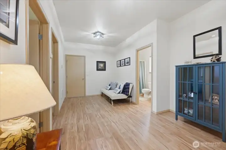 Main floor family gathering room~garage access door straight ahead