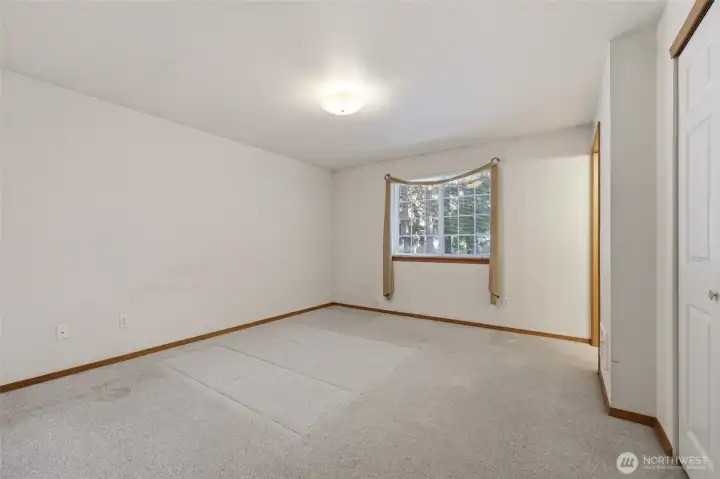 Primary bedroom - window faces the backyard.