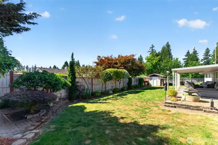 There's plenty of space for play or relaxation and the water feature creates a tranquil sound for enjoying this beautiful space